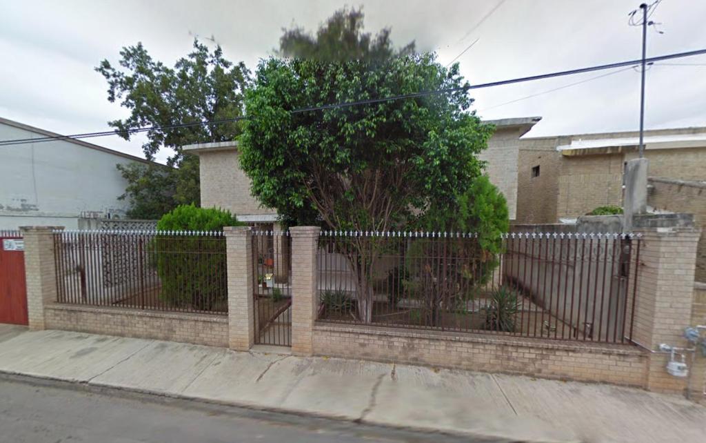 a brick fence in front of a house at Meson Sonora in Nuevo Laredo
