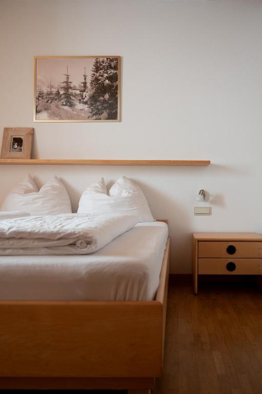 Postel nebo postele na pokoji v ubytování Residence Veider