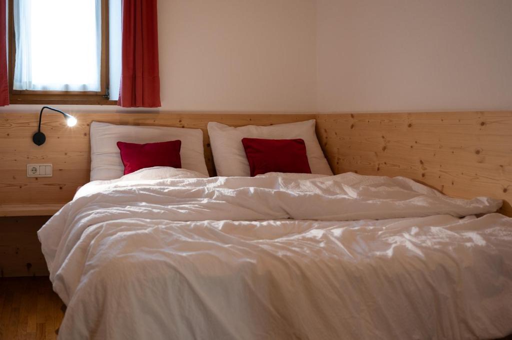 Postel nebo postele na pokoji v ubytování Residence Veider
