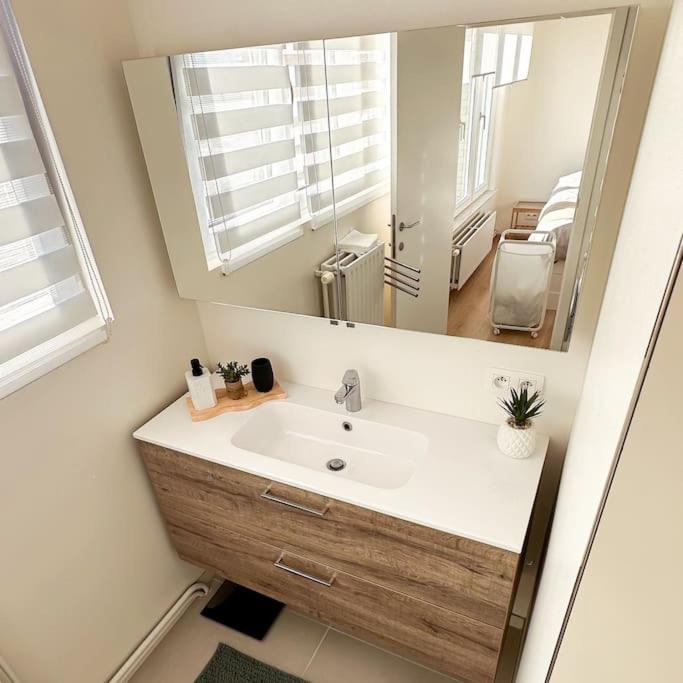 Koupelna v ubytování Gezellig appartement te Bredene