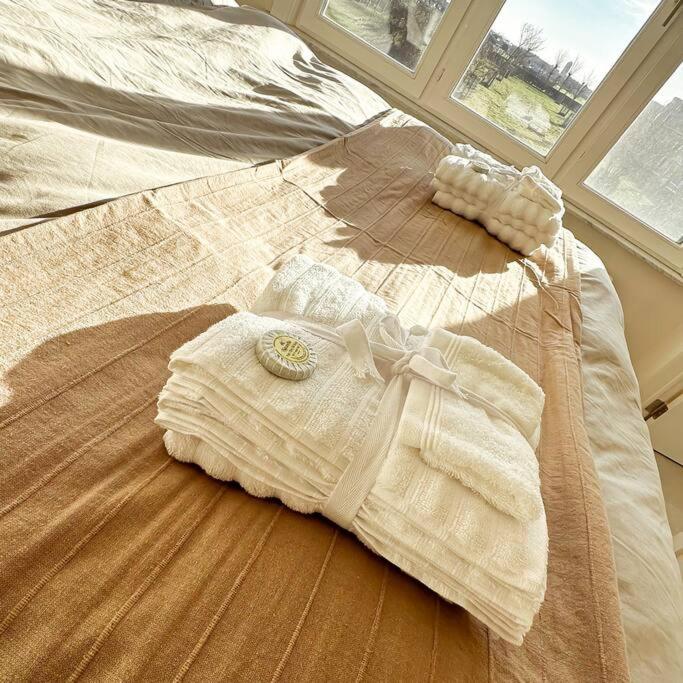 Postel nebo postele na pokoji v ubytování Gezellig appartement te Bredene