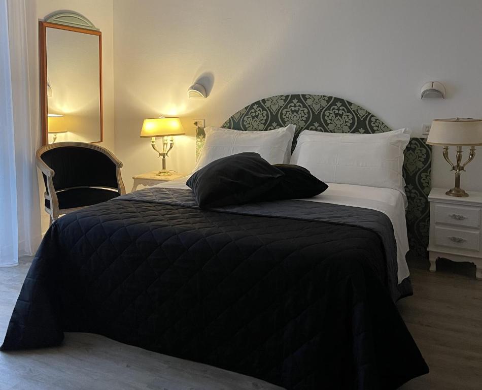 Łóżko lub łóżka w pokoju w obiekcie CASA MAJOR Appartamenti