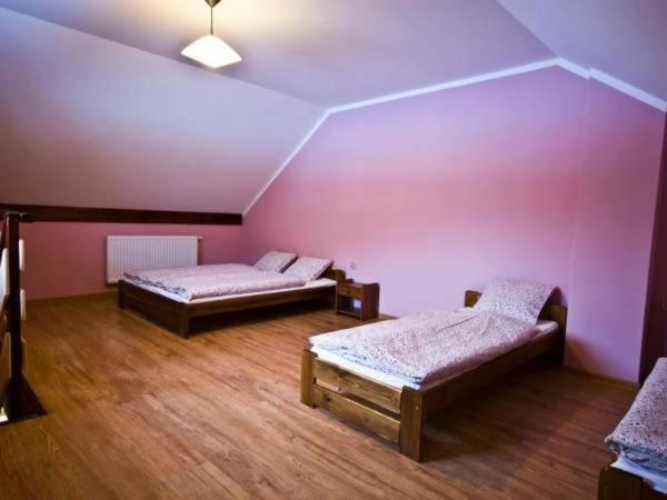 Postel nebo postele na pokoji v ubytování Willa Dona