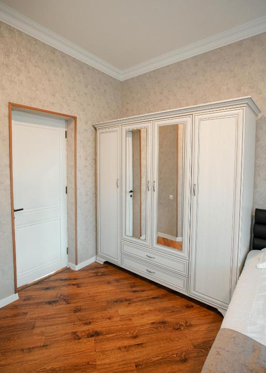 Postel nebo postele na pokoji v ubytování Lunisi Kvareli
