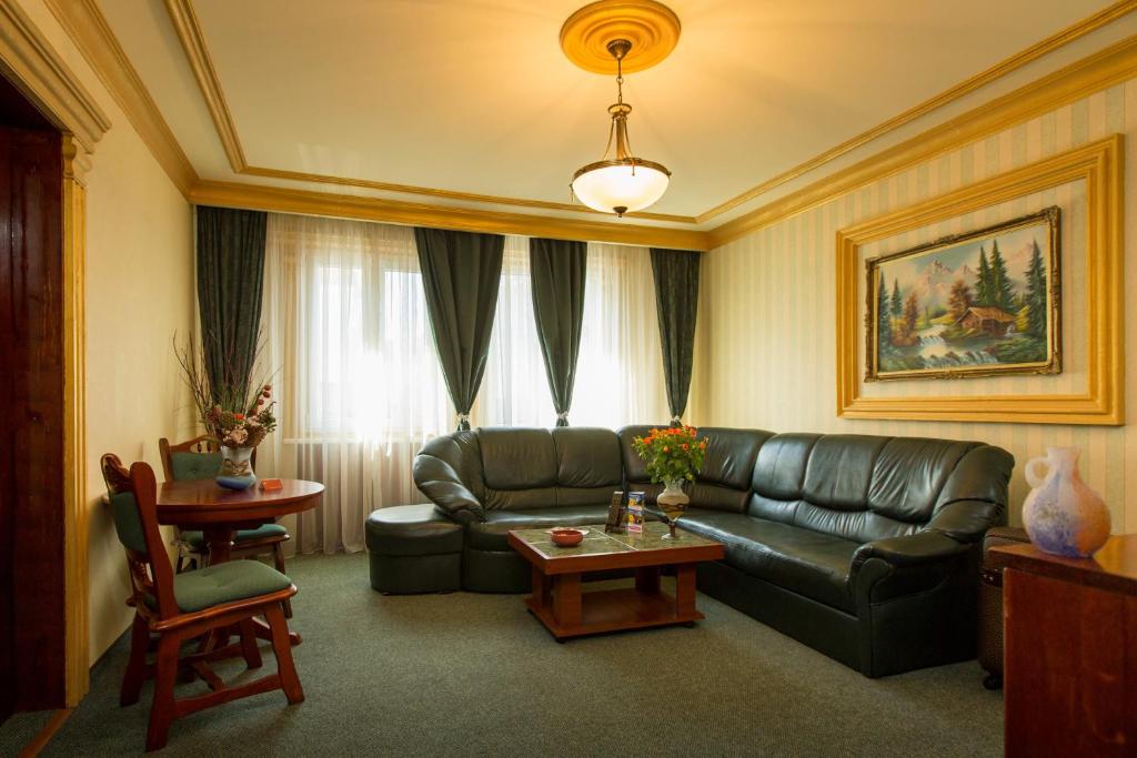 Posezení v ubytování Bucharest Comfort Suites Hotel