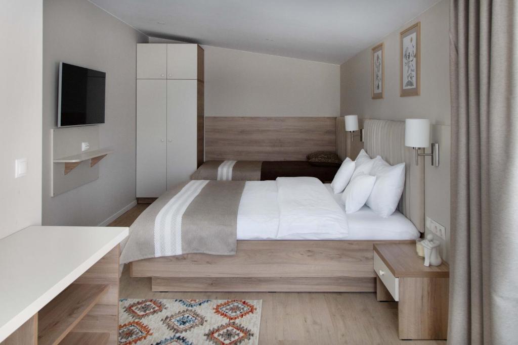 Postel nebo postele na pokoji v ubytování CASA ENCIAN