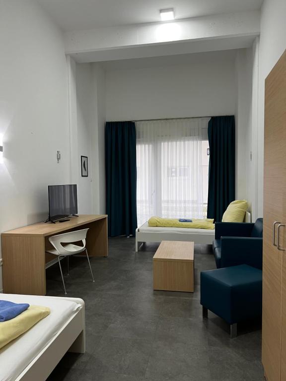 Postel nebo postele na pokoji v ubytování Fabella Flats Forchheim