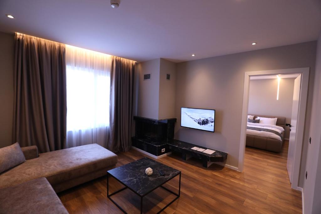 Postel nebo postele na pokoji v ubytování Dallga Suites