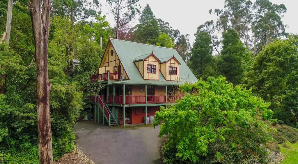 an aerial view of a house in the woods at Mountain Lodge in Mount Dandenong