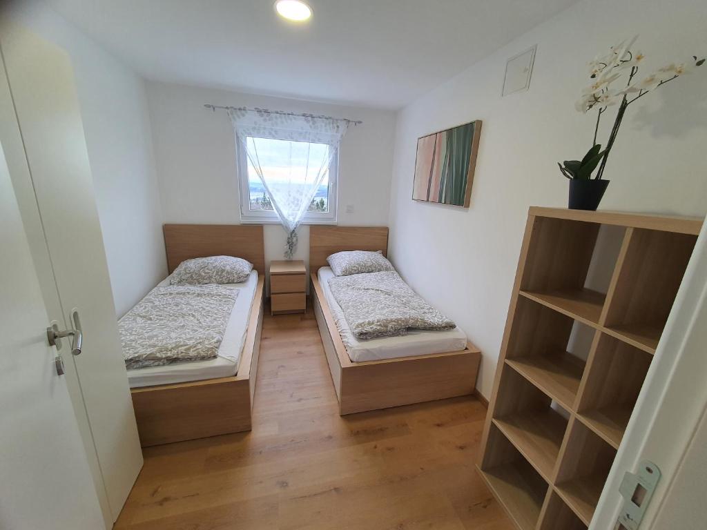 Ένα ή περισσότερα κρεβάτια σε δωμάτιο στο Apartment Weizblick
