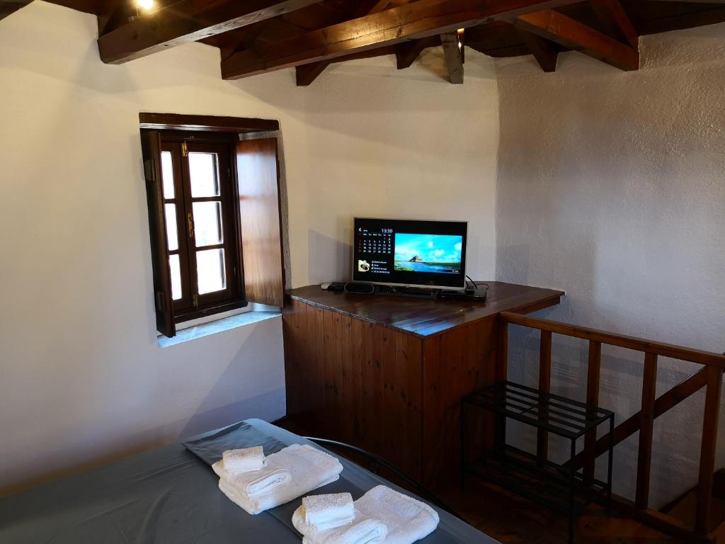 TV a/nebo společenská místnost v ubytování Kissamitakis Guesthouse