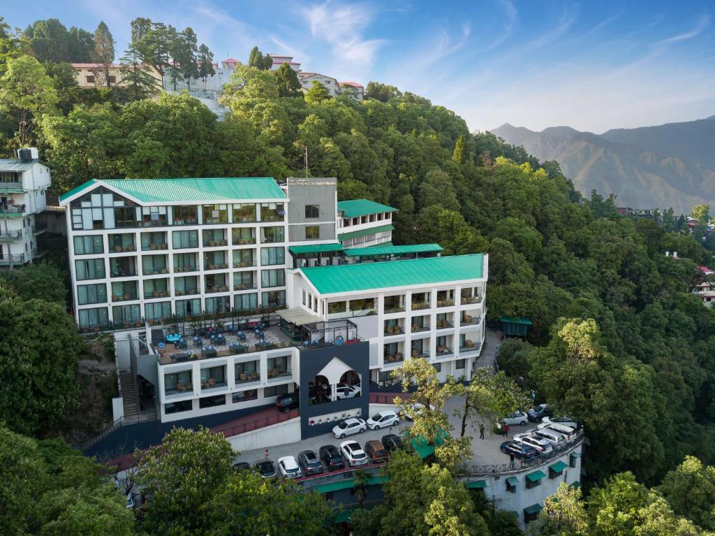 an aerial view of a hotel on a mountain at The Oasis Mussoorie - A Member of Radisson Individuals in Mussoorie