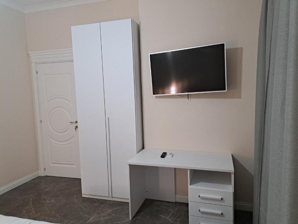 Telewizja i/lub zestaw kina domowego w obiekcie Amendola Rooms