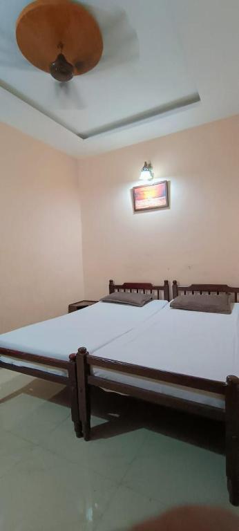 Postel nebo postele na pokoji v ubytování Classic Tourist Home