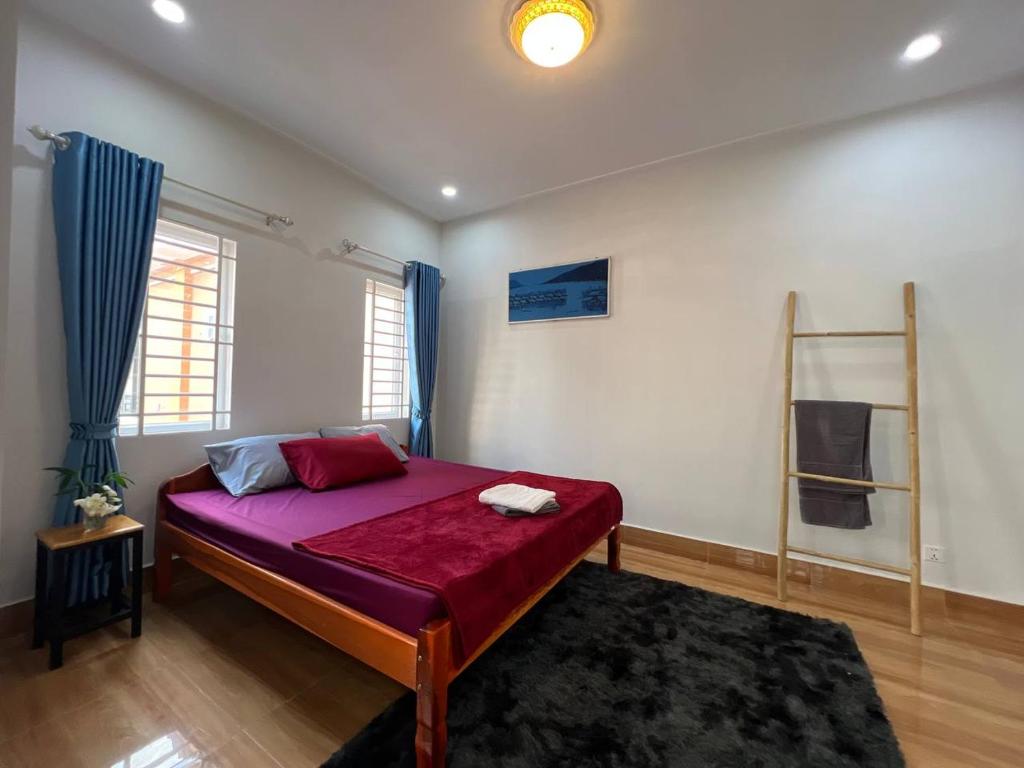 Postel nebo postele na pokoji v ubytování The Hub Kampot