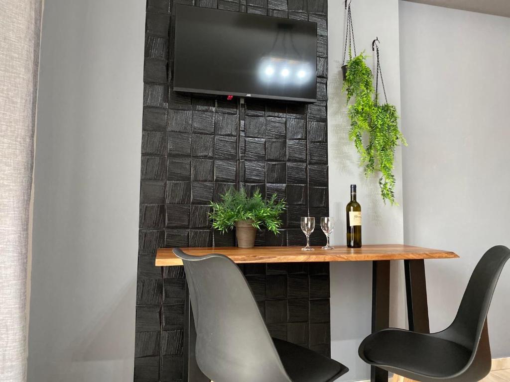 TV a/nebo společenská místnost v ubytování R&K MODERN APARTMENT
