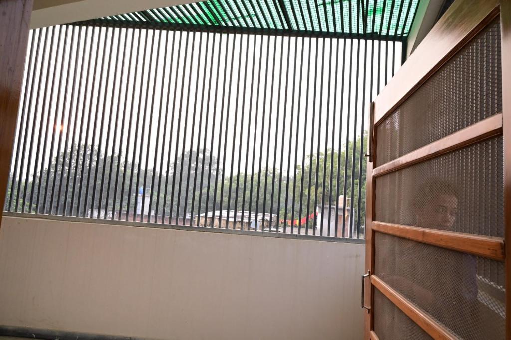 Balkón nebo terasa v ubytování Surendra Villa Home Stay