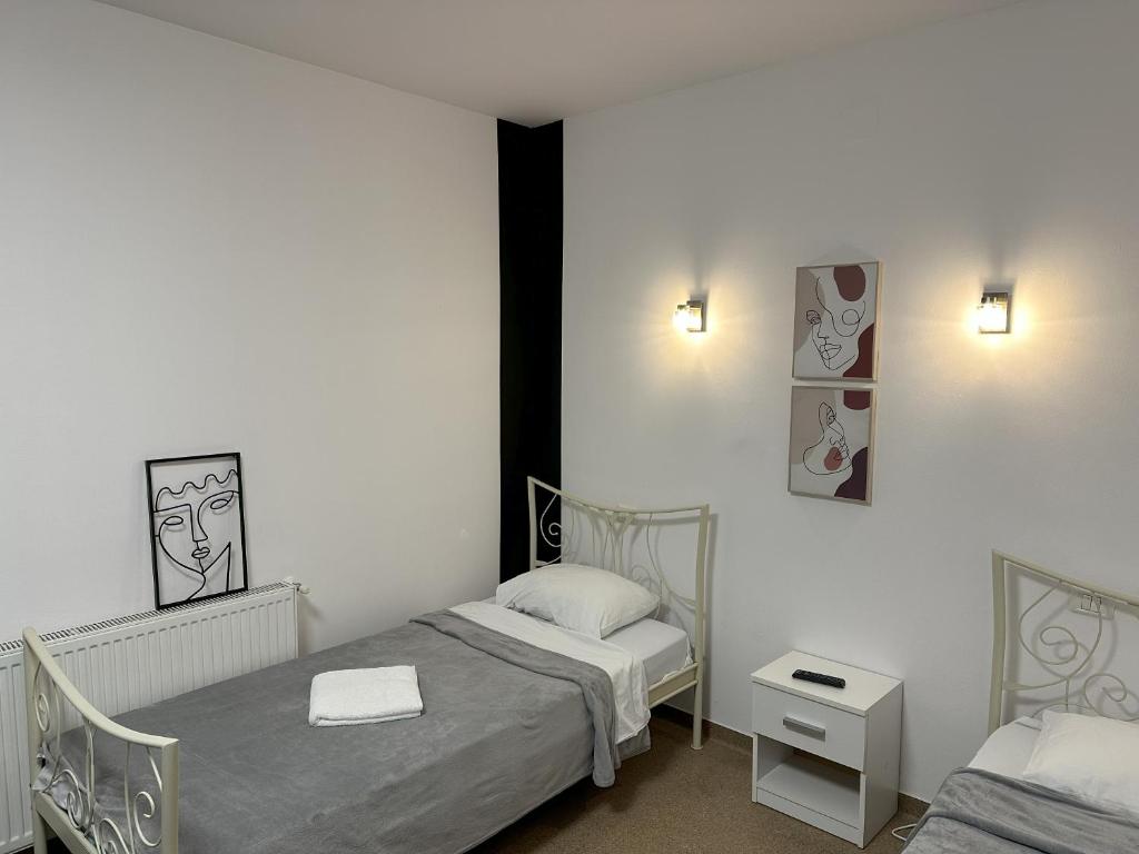 Postel nebo postele na pokoji v ubytování Hotel ENZO