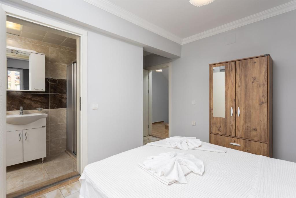 Postel nebo postele na pokoji v ubytování Villa Ada 1