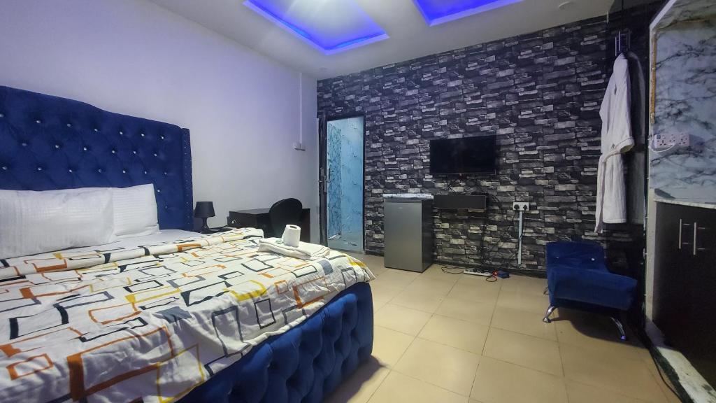 Postel nebo postele na pokoji v ubytování Weltons Apartments
