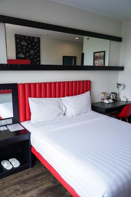 Voodi või voodid majutusasutuse Kalya Hotel Bandung Dago toas