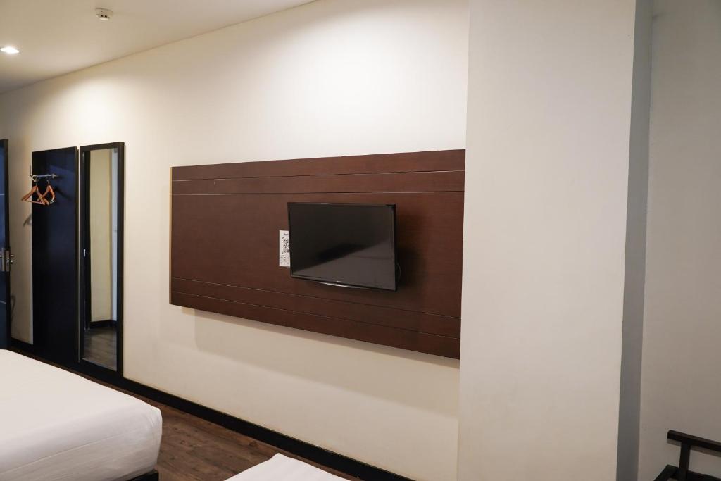 Voodi või voodid majutusasutuse Kalya Hotel Bandung Dago toas