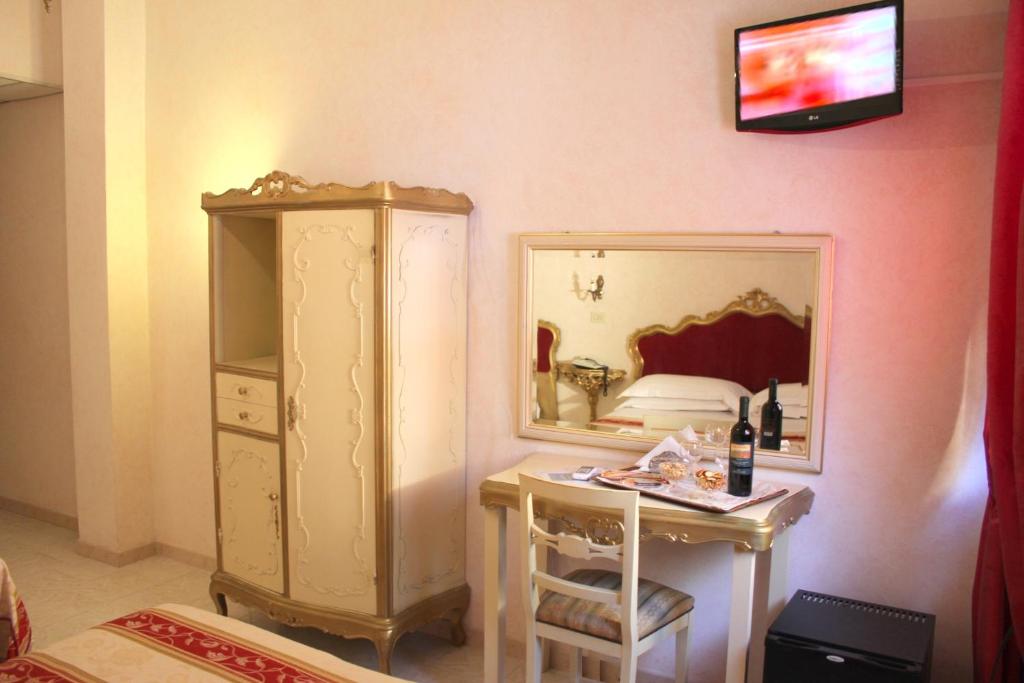 TV a/nebo společenská místnost v ubytování Hotel Romulus