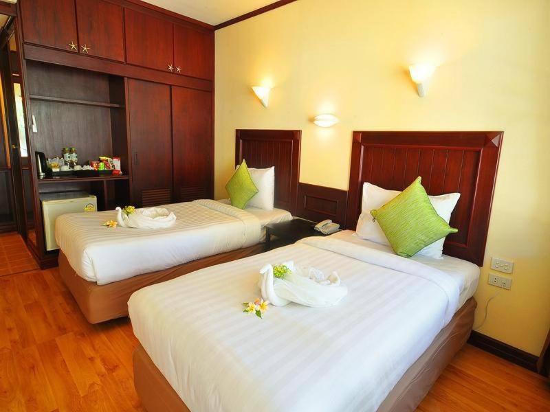 Postel nebo postele na pokoji v ubytování Isle Beach Resort Krabi-SHA