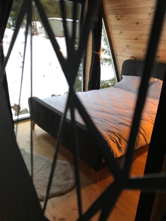 Postel nebo postele na pokoji v ubytování Black Chalet