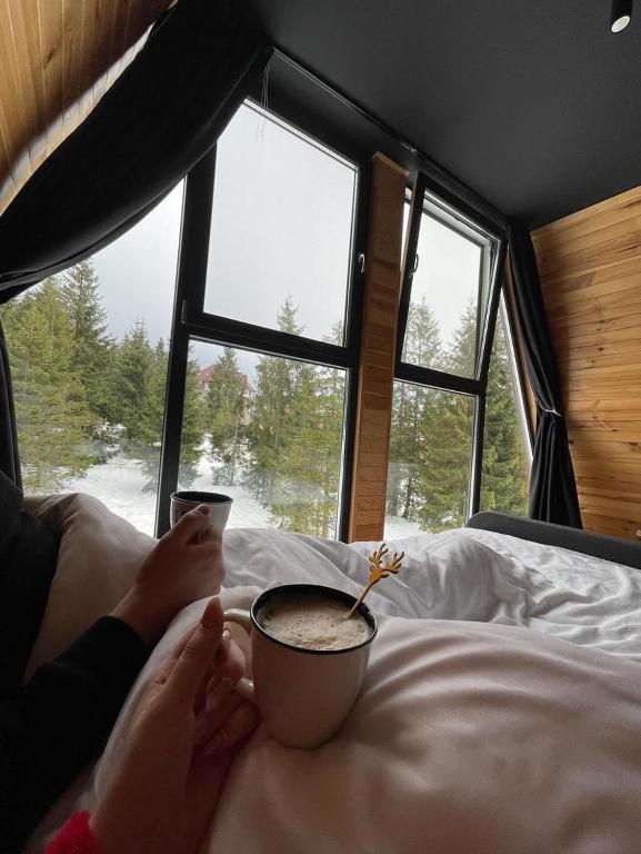 Postel nebo postele na pokoji v ubytování Black Chalet