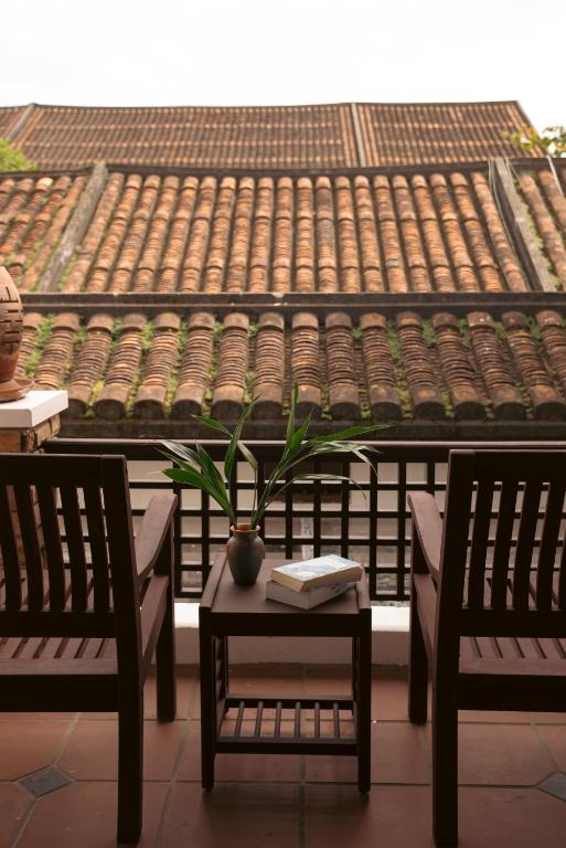 Balkón nebo terasa v ubytování Hoianese Heritage Hotel - Truly Hoi An