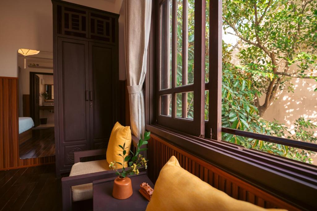 Balkón nebo terasa v ubytování Hoianese Heritage Hotel - Truly Hoi An