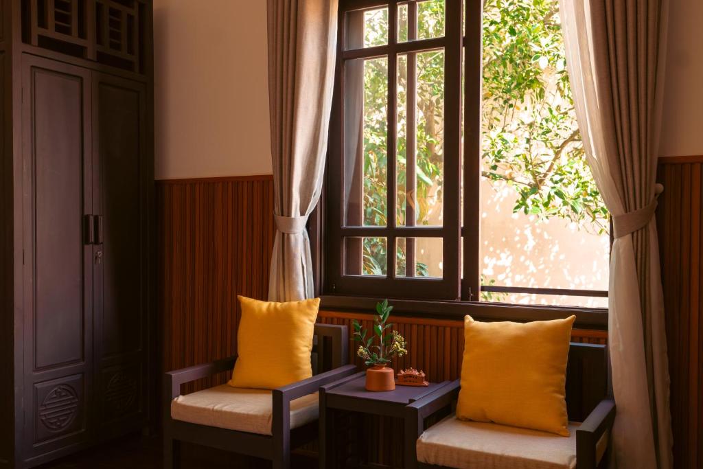 Posezení v ubytování Hoianese Heritage Hotel - Truly Hoi An