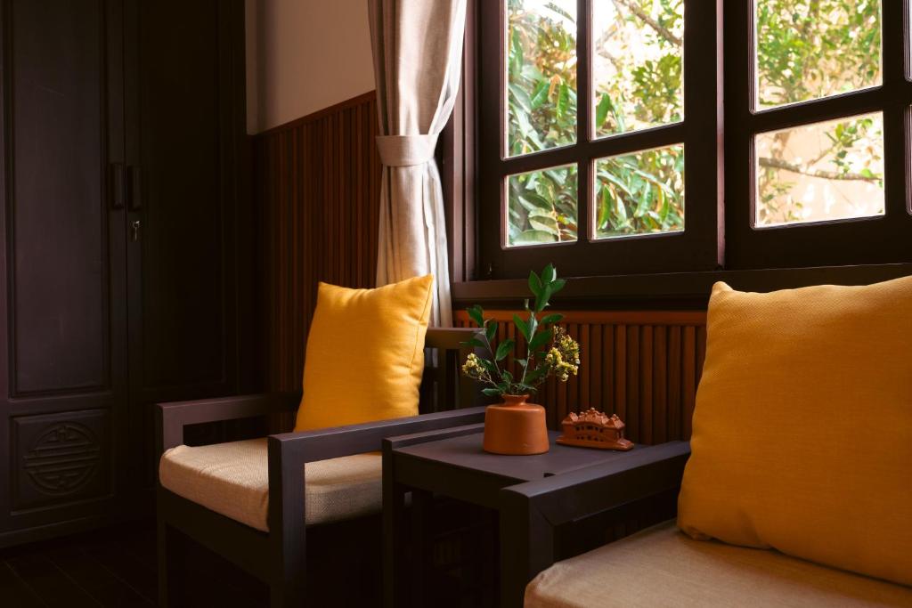 Posezení v ubytování Hoianese Heritage Hotel - Truly Hoi An
