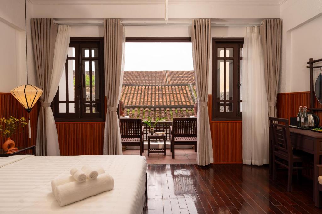 Balkón nebo terasa v ubytování Hoianese Heritage Hotel - Truly Hoi An