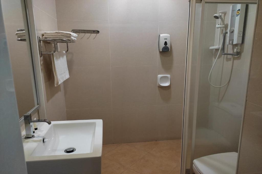 Koupelna v ubytování Hotel D'New 1 KK Sabah