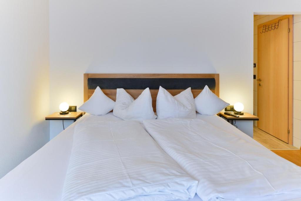 Postel nebo postele na pokoji v ubytování Haus Margrith Alpenblick Appartements
