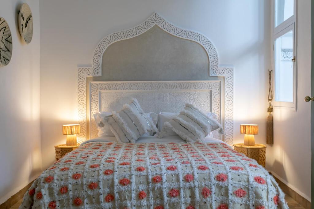 Postel nebo postele na pokoji v ubytování Riad Zeitoun Palace