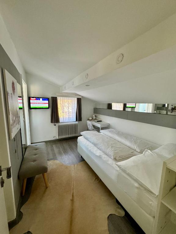 Uma cama ou camas num quarto em Boutique Hotel Oase