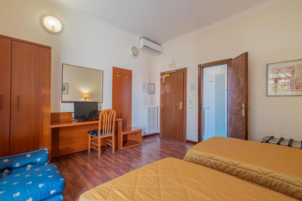 TV a/nebo společenská místnost v ubytování Hotel Monte Verde