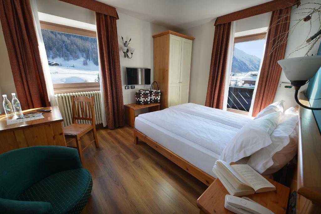TV a/nebo společenská místnost v ubytování Hotel Primula