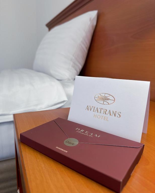 Postel nebo postele na pokoji v ubytování Aviatrans Hotel