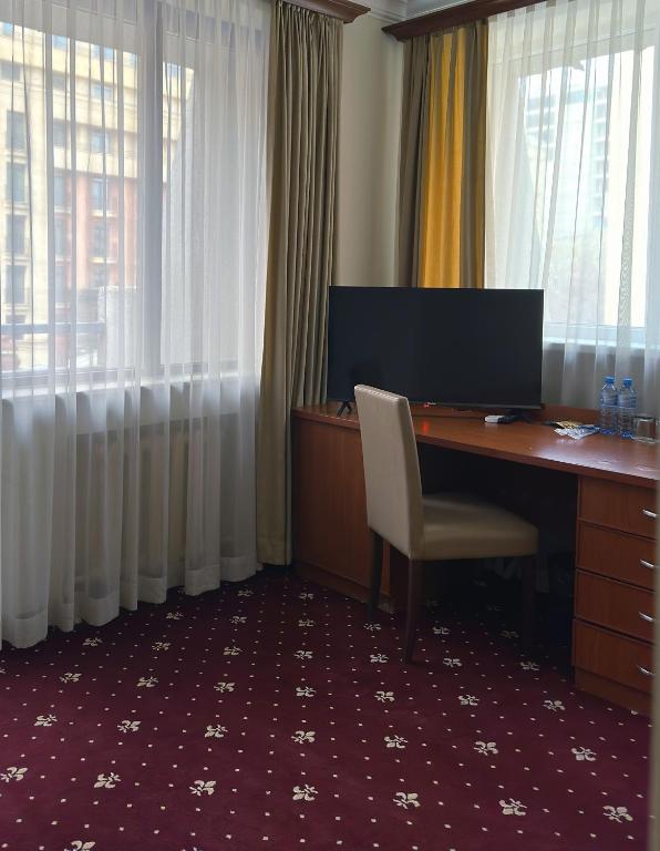 TV a/nebo společenská místnost v ubytování Aviatrans Hotel