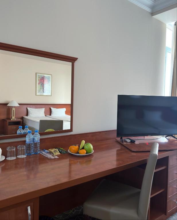 TV a/nebo společenská místnost v ubytování Aviatrans Hotel
