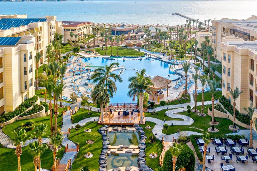 an aerial view of a resort with a pool at Tropitel Sahl Hasheesh in Hurghada