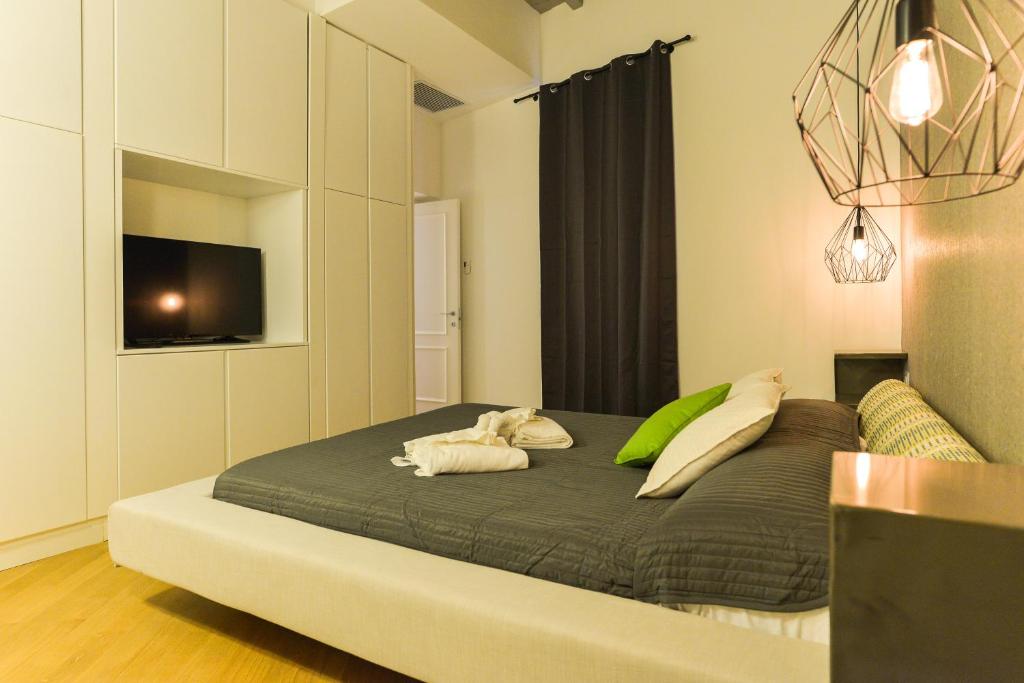 Łóżko lub łóżka w pokoju w obiekcie EVE Luxury Apartments Pantheon