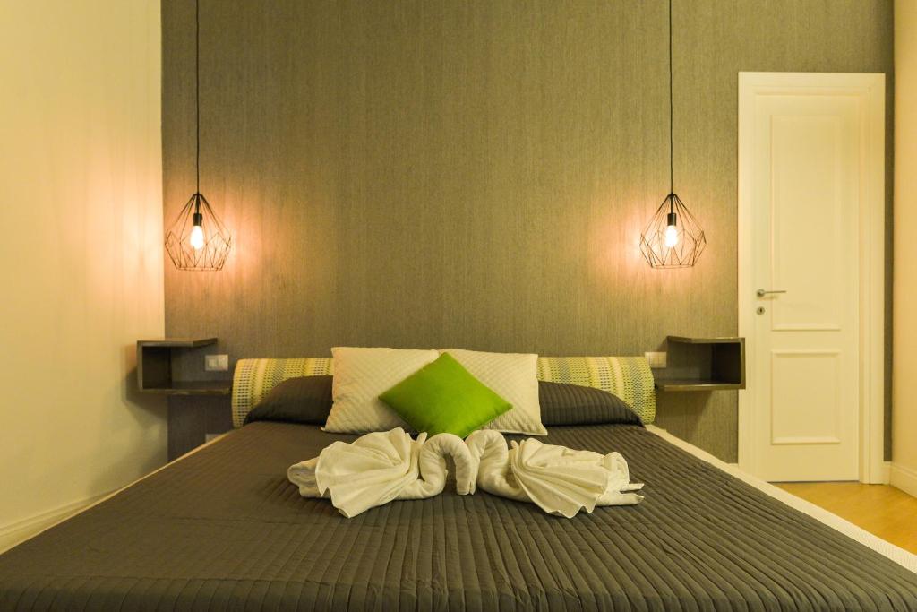 Łóżko lub łóżka w pokoju w obiekcie EVE Luxury Apartments Pantheon