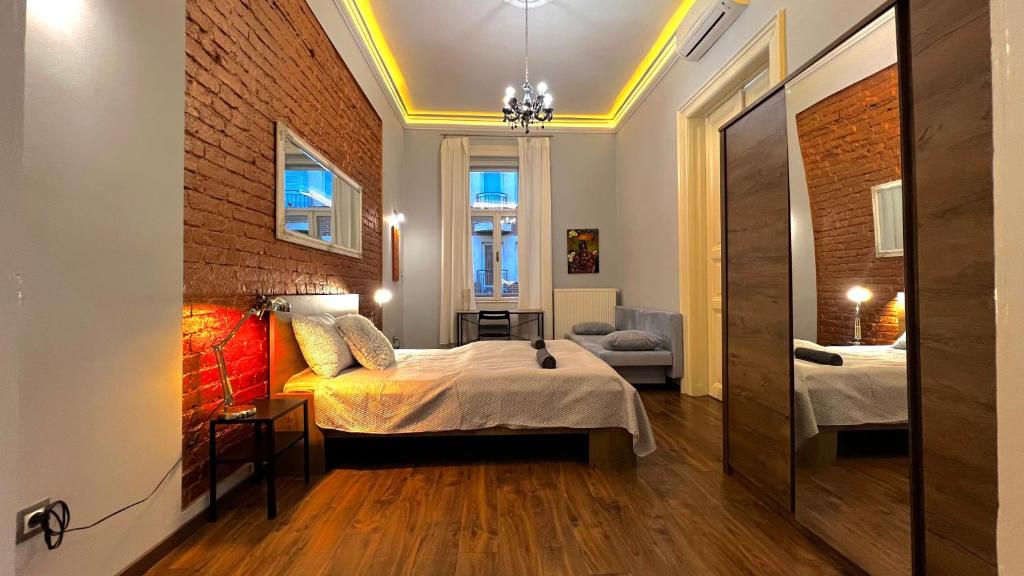 Posteľ alebo postele v izbe v ubytovaní V6 Apartment by Small Home Budapest