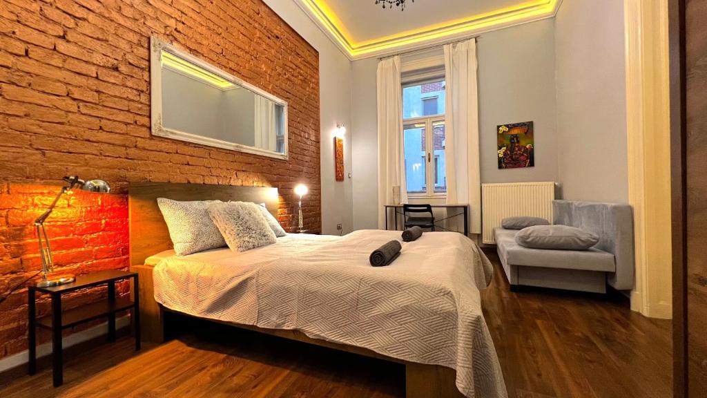 Posteľ alebo postele v izbe v ubytovaní V6 Apartment by Small Home Budapest