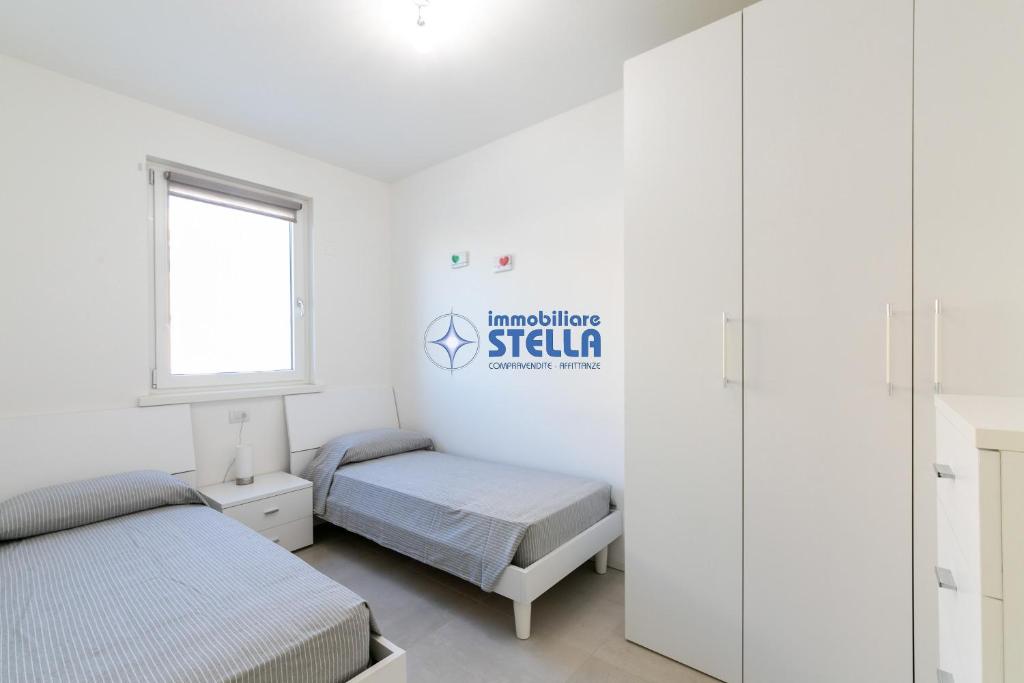 Postel nebo postele na pokoji v ubytování Cala Blu